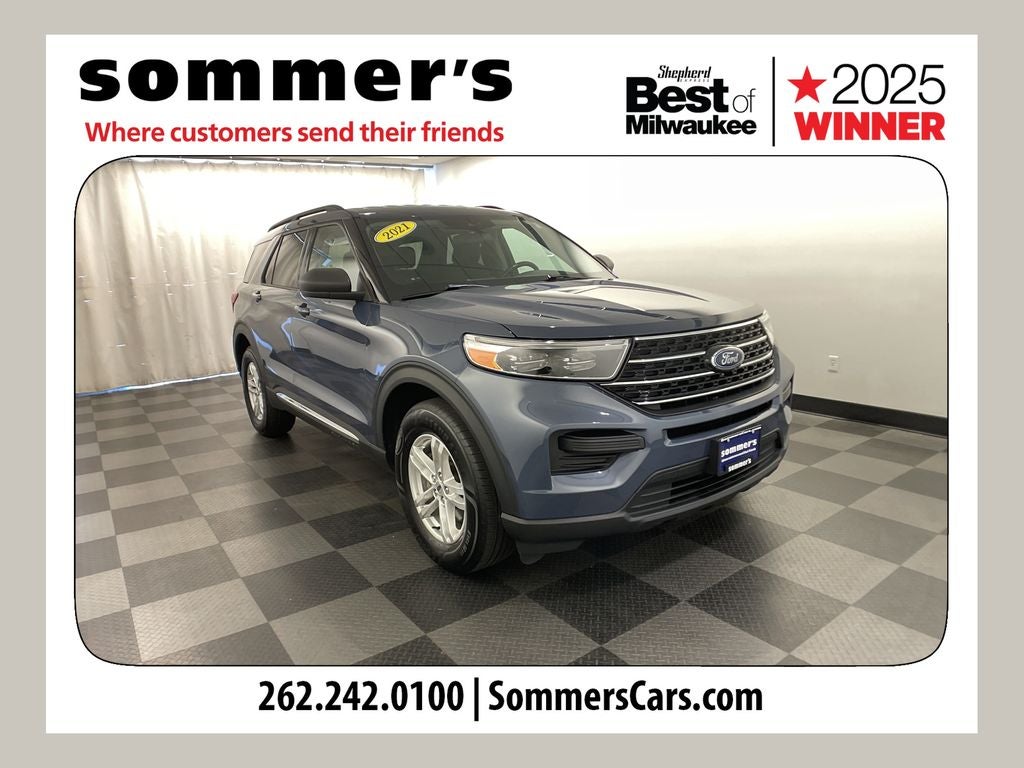 2021 Ford Explorer XLT in Blue Metallic — front three-quarter view