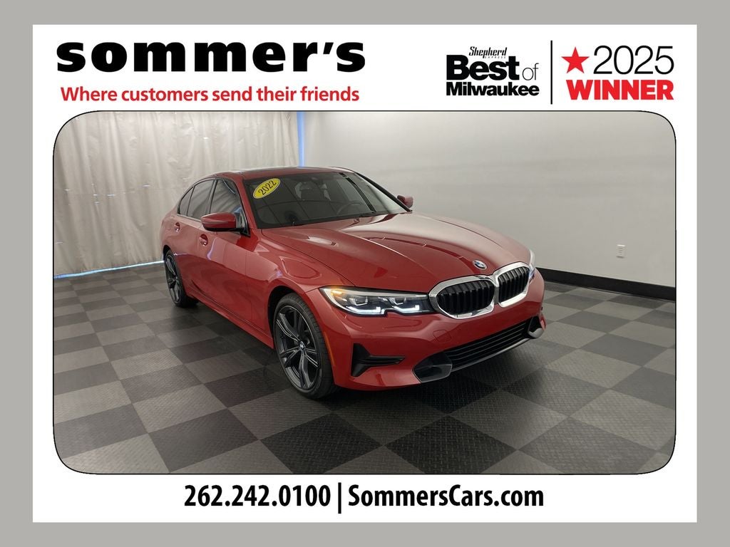 2022 BMW 3 Series 330i xDrive in Melbourne Red Metallic — front three-quarter view