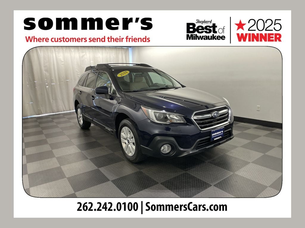 2018 Subaru Outback 2.5i Premium in Dark Blue Pearl — front three-quarter view