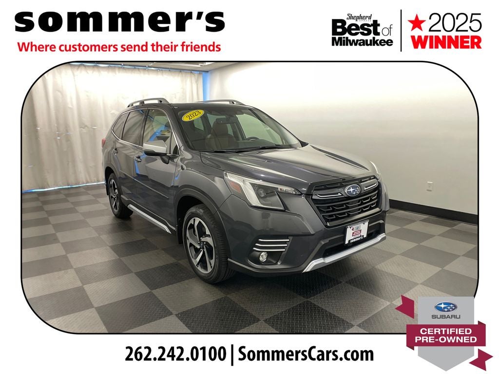 2023 Subaru Forester Touring in Magnetite Gray Metallic — front three-quarter view
