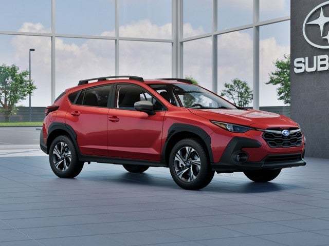 2026 Subaru CROSSTREK Premium in Lithium Red Pearl — front three-quarter view