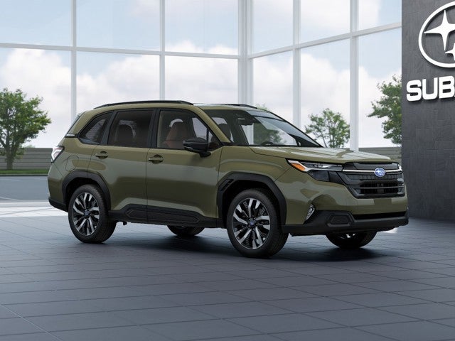 2026 Subaru FORESTER Touring in Autumn Green Metallic — front three-quarter view