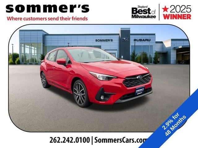 2026 Subaru IMPREZA Sport in Pure Red — front three-quarter view