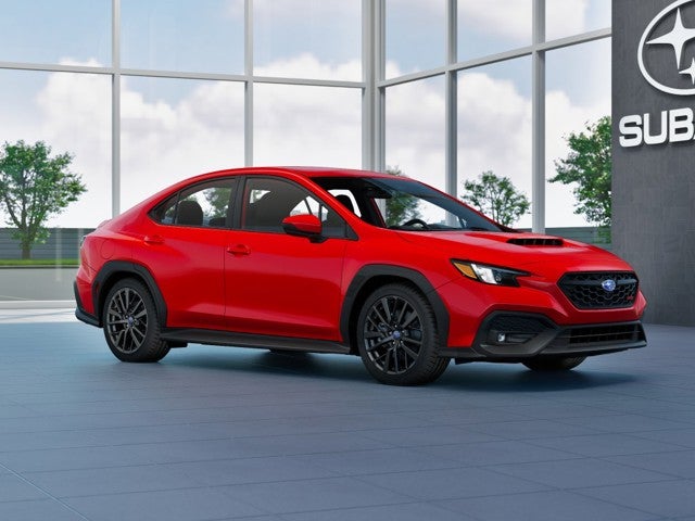 2026 Subaru WRX Premium in Ignition Red — front three-quarter view